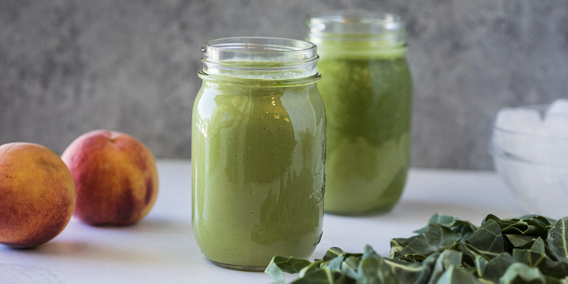 two glasses of Peaches and Greens Smoothie